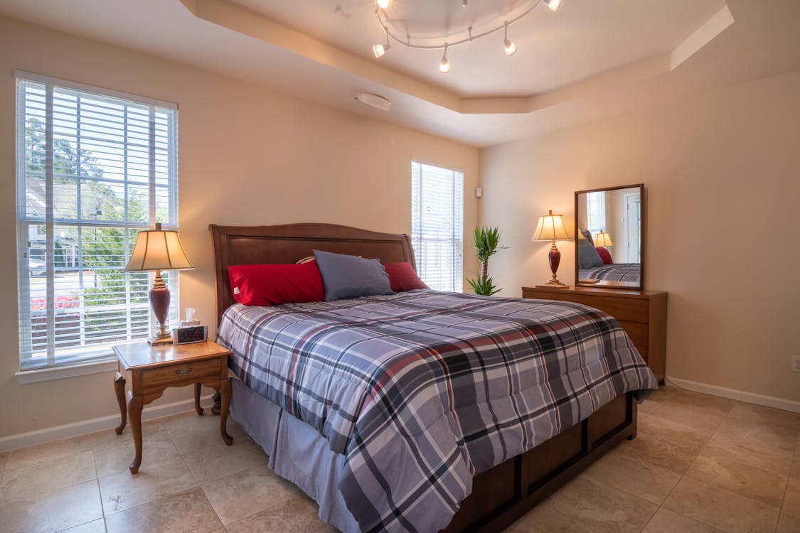 Free Photo of a Bed in a Clean Room Stock Photo