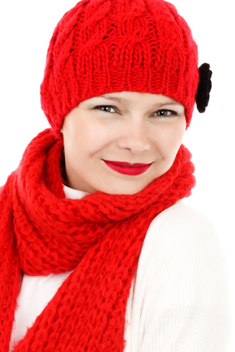 Woman In Red Crochet Knit Cap And Scarf