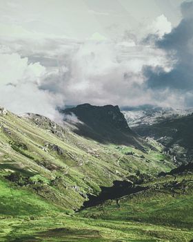 Beautiful mountain range under a cloudy sky in Santiago de Chuco, a tranquil natural setting.