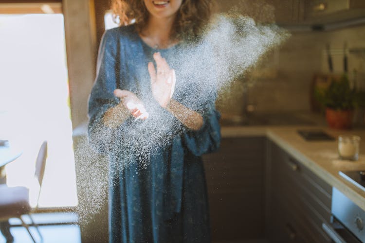 Woman In Blue Long Sleeve Dress Clapping