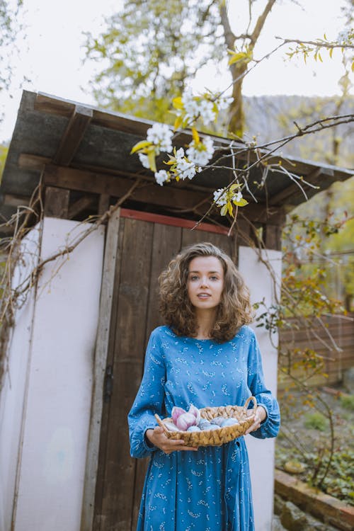 Free Woman With a Basket of Easter Eggs Stock Photo