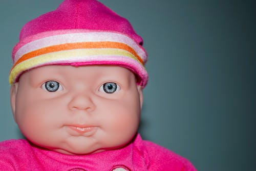 Free stock photo of baby, baby doll, blue eyes Stock Photo