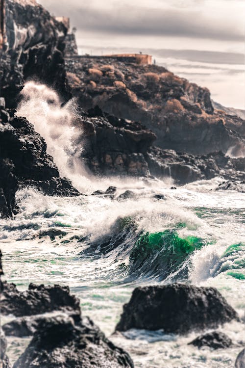 Photo Of Waves Crashing On Rocks