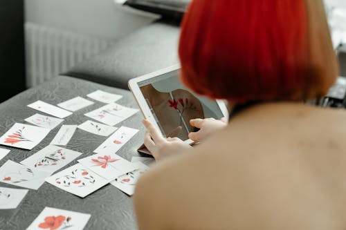 Free Woman Playing Chess on Table Stock Photo
