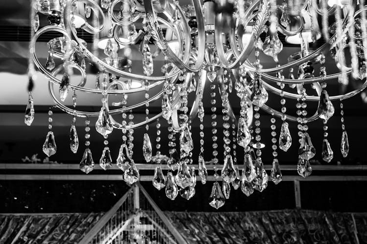 Grayscale Photo Of Glass Chandelier