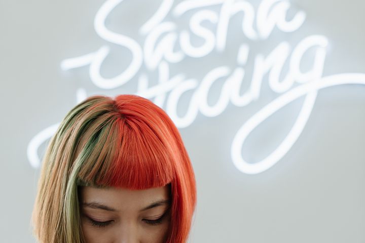 Orange Haired Woman in White Crew Neck Shirt