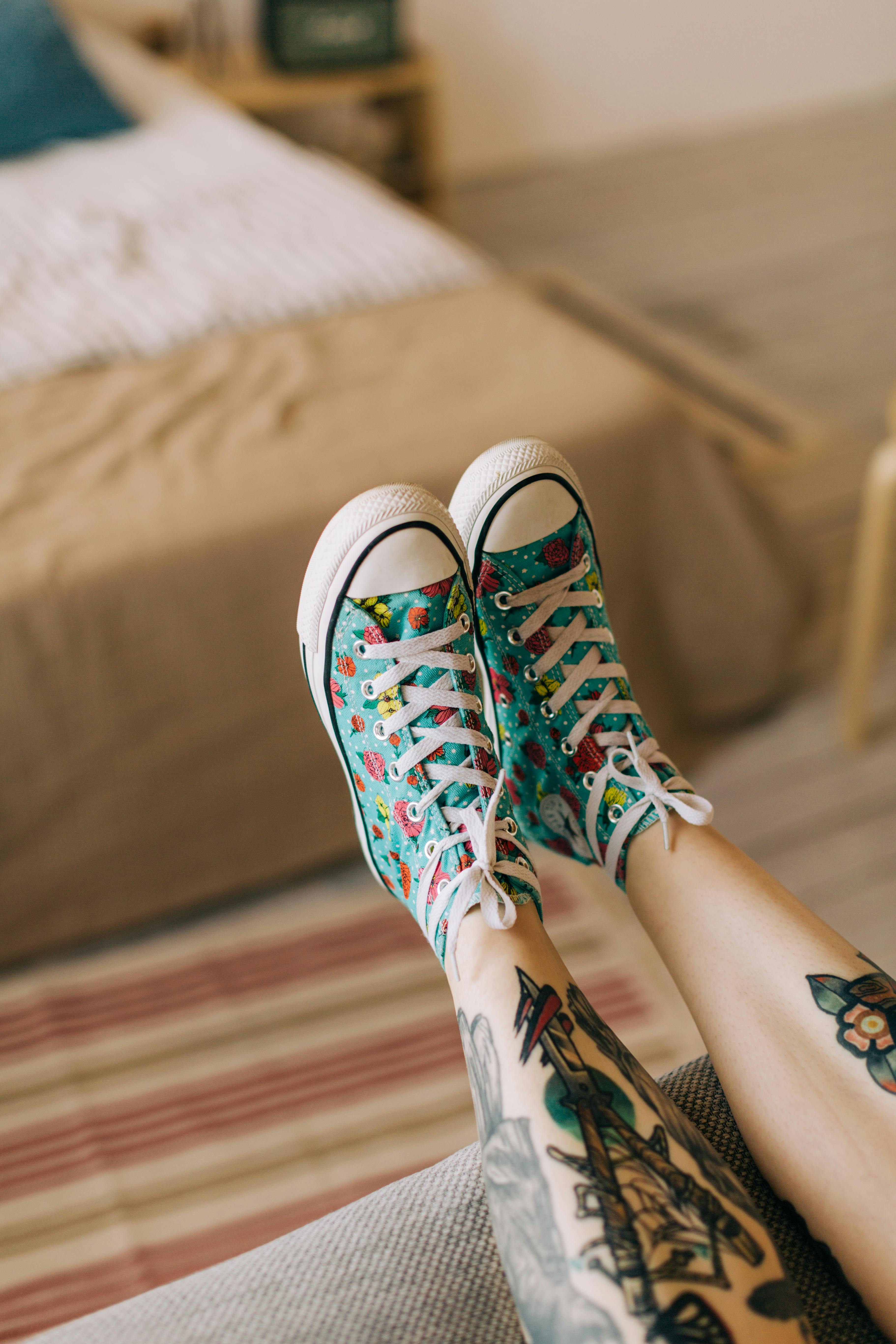 A table spread with various small dishes including kimchi, rice, and vegetables
