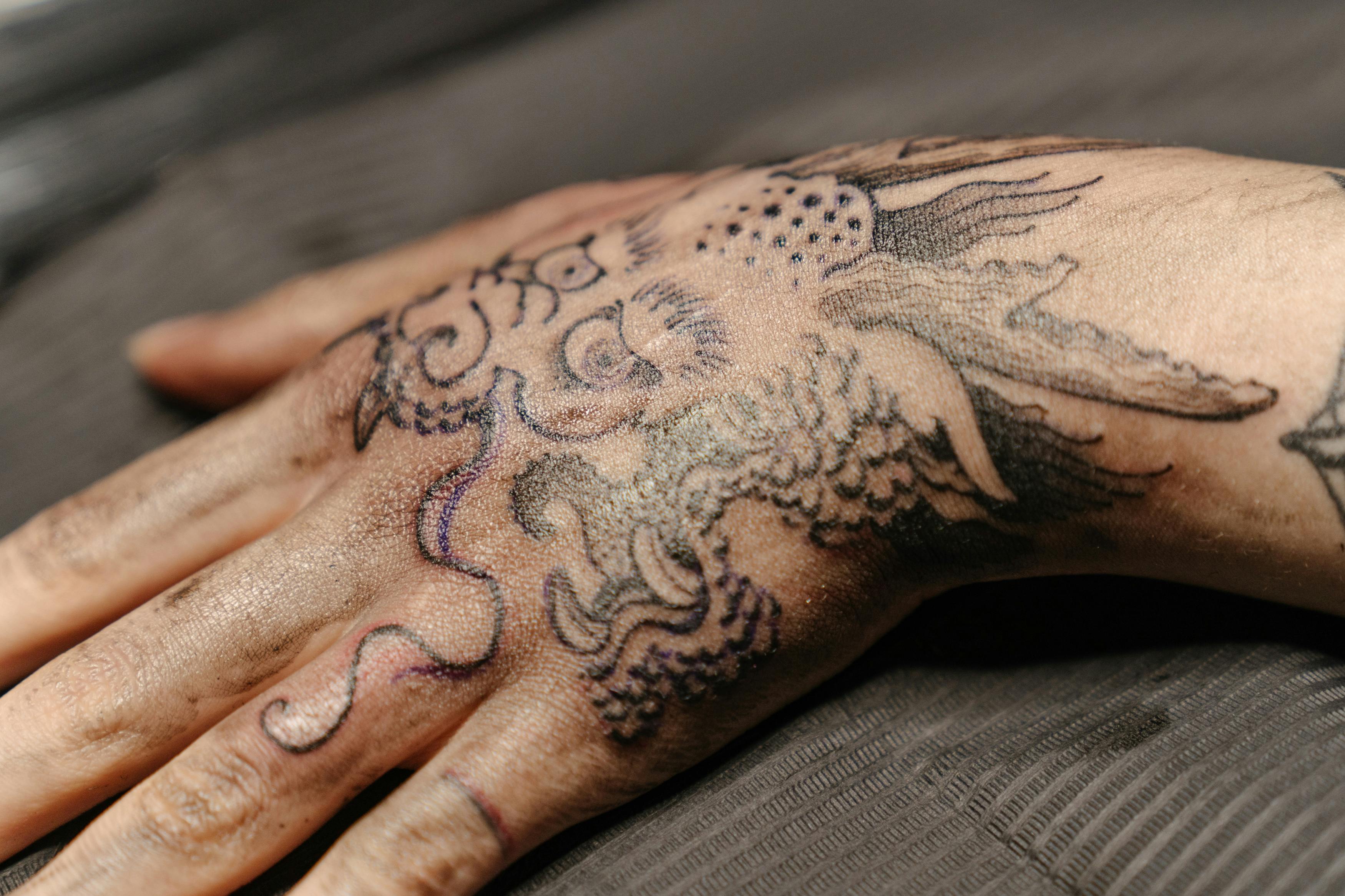 Men's Hand Tattoos: Expressive Art for the Modern Gentlemen