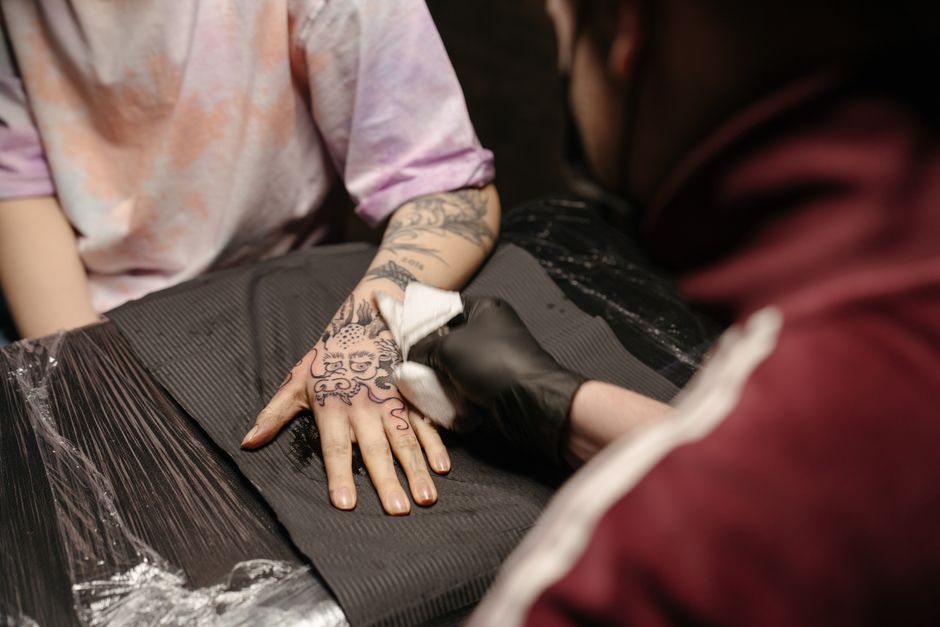 A well-healed tattoo showing crisp lines from proper aftercare A well-healed tattoo showing crisp lines from proper aftercare