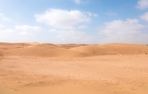 Free Sand Dunes Under White Clouds Stock Photo