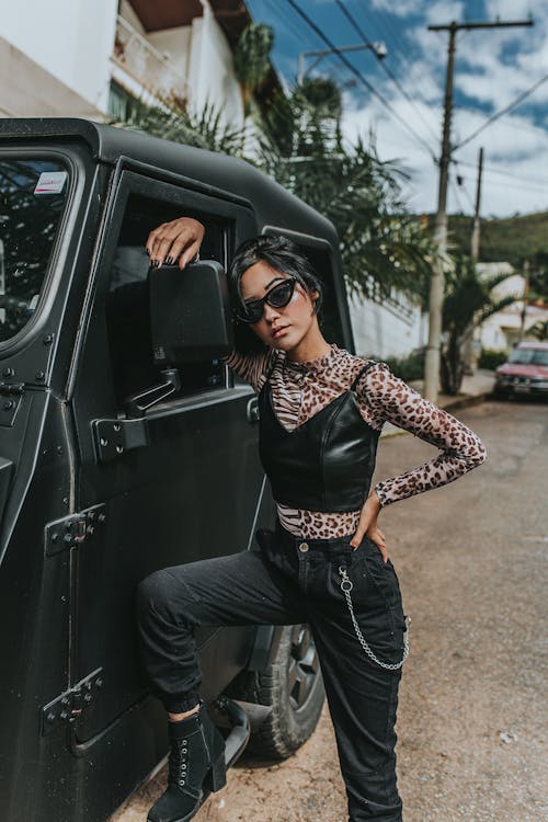 Free Photo Of Woman Leaning On Car Stock Photo