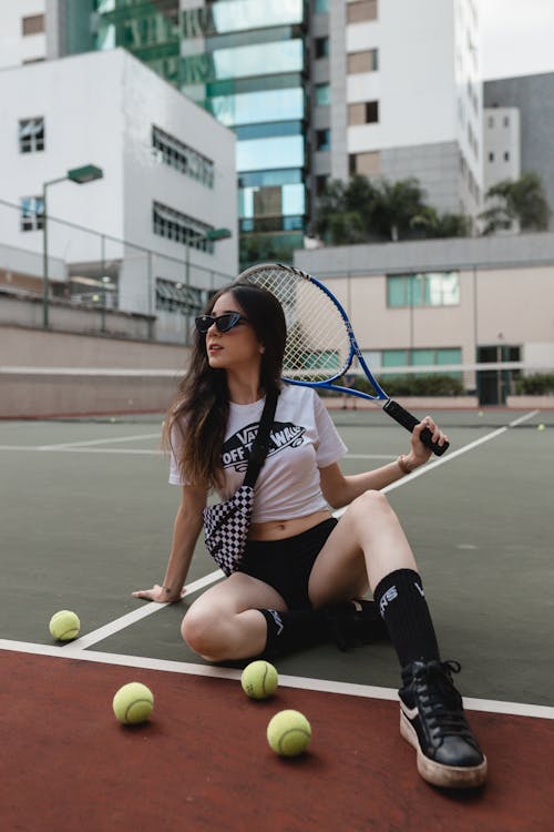 Photo Of Woman Holding Racket