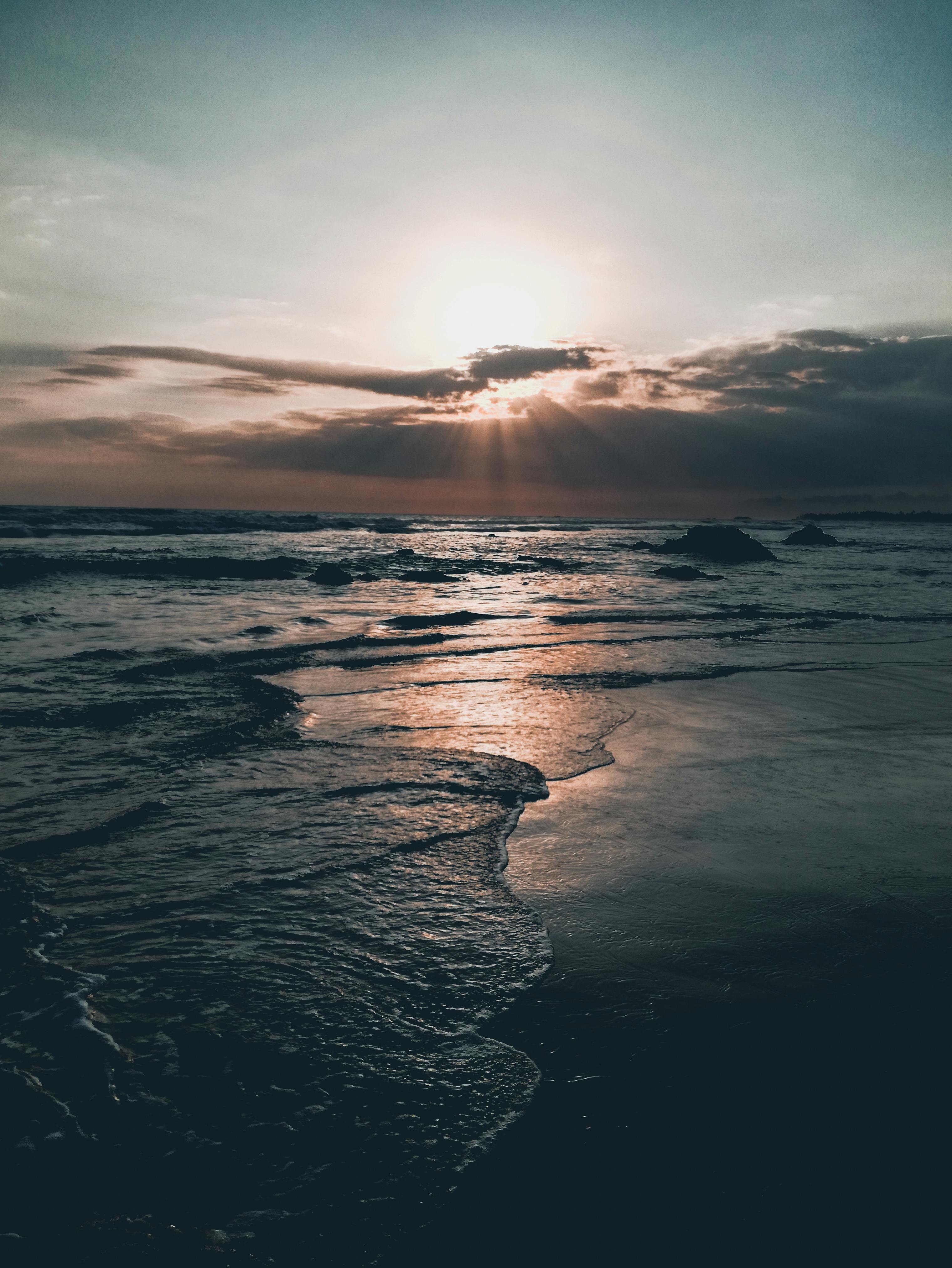 Sea Waves Rushing on Shore during Sunset · Free Stock Photo