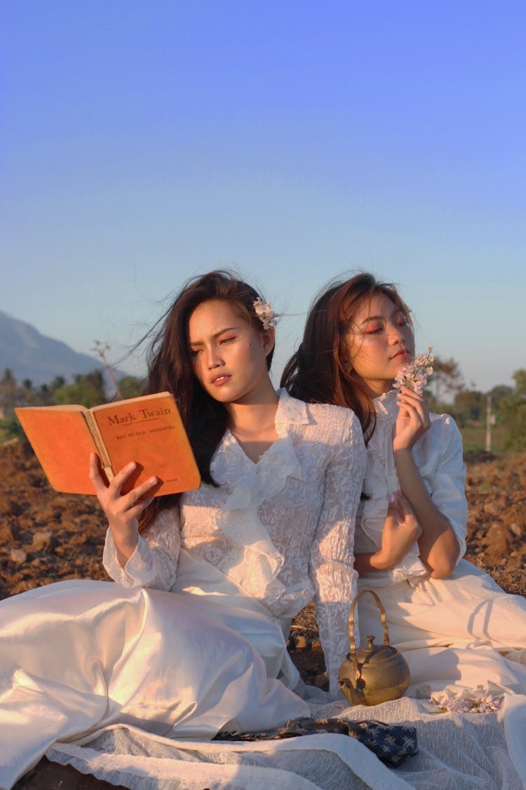 Photo Of Woman Reading Book 