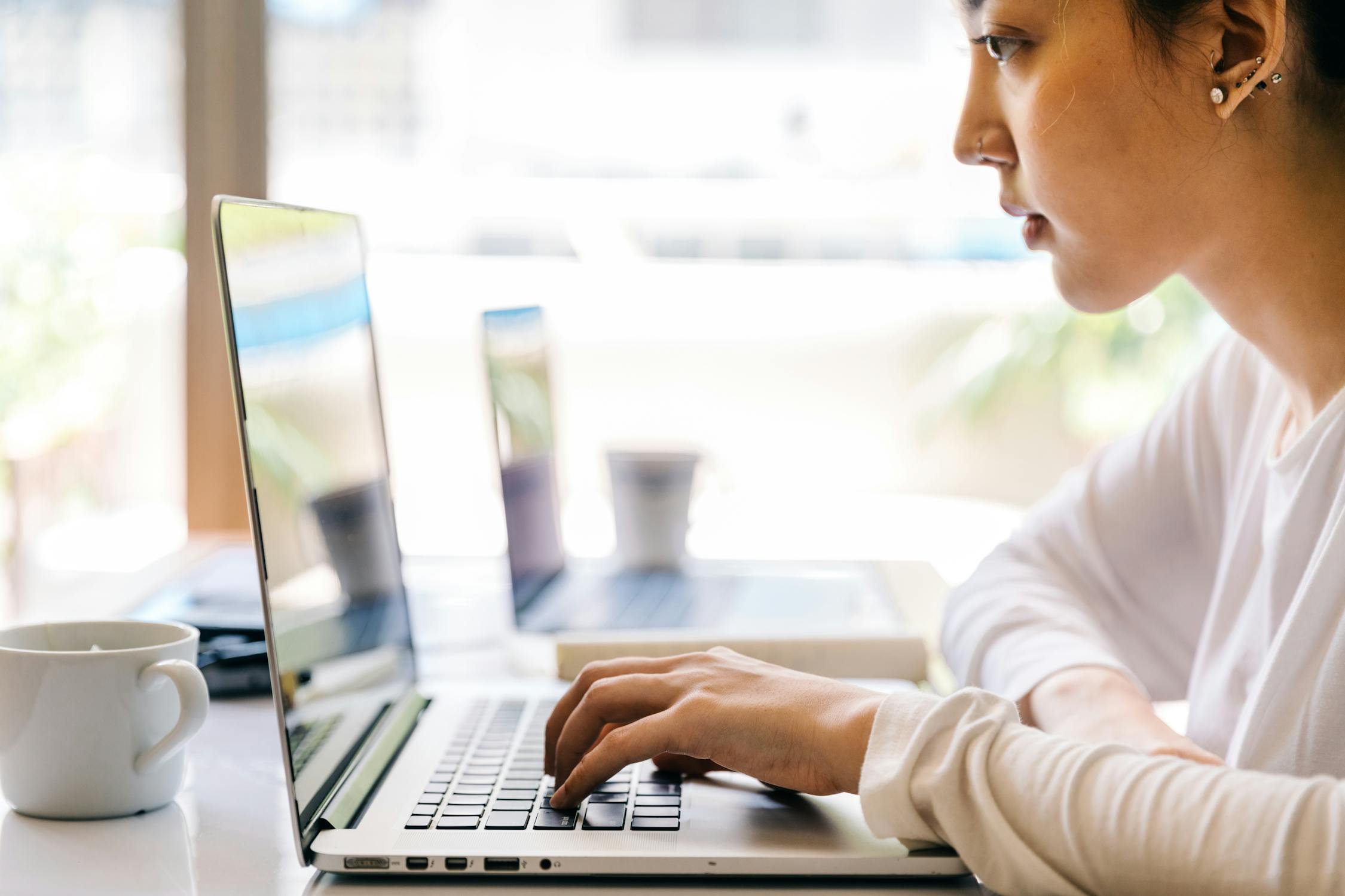 woman using laptop