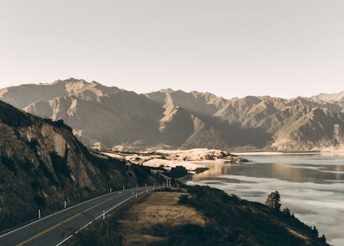 Free Road Beside Body of Water Stock Photo