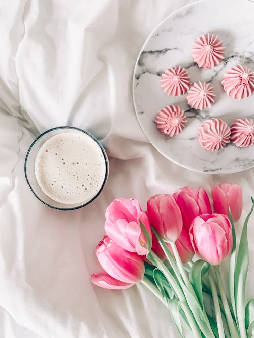 Photo Of Tulips Near Ceramic Plate