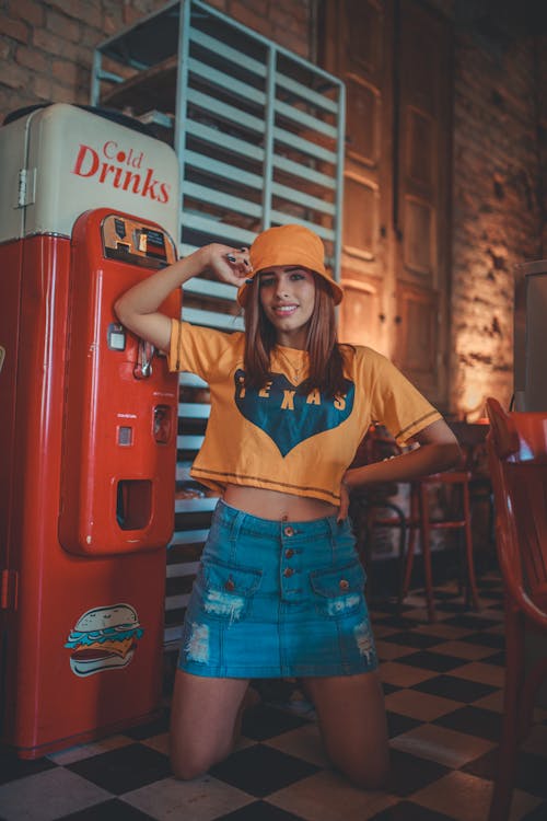 Free Happy young woman in cafe Stock Photo