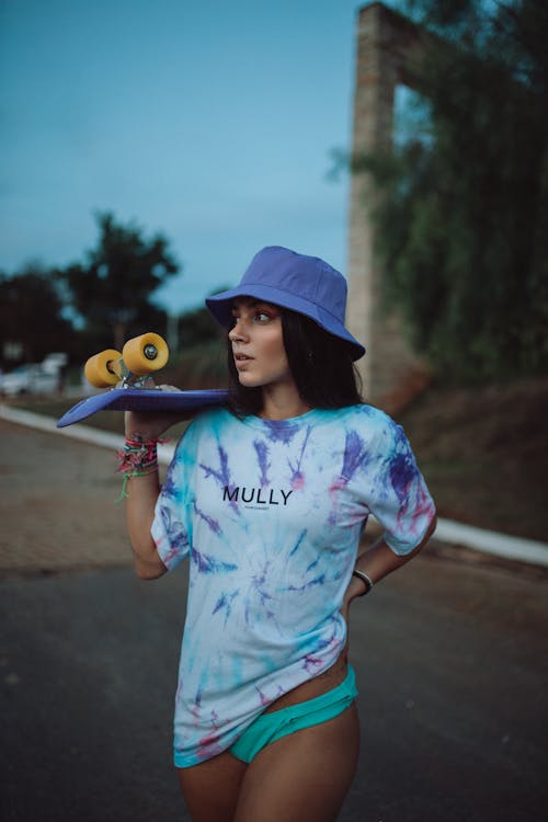 Free Photo Of Woman Carrying Long Board Stock Photo