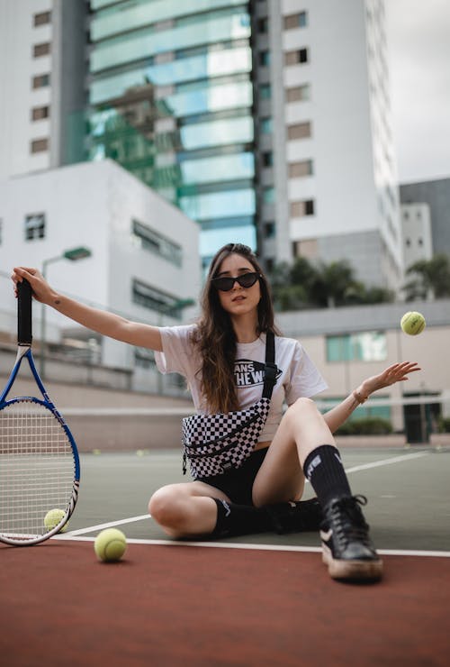 Photo Of Woman Holding Racket
