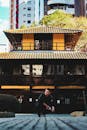 Man resting in front of temple