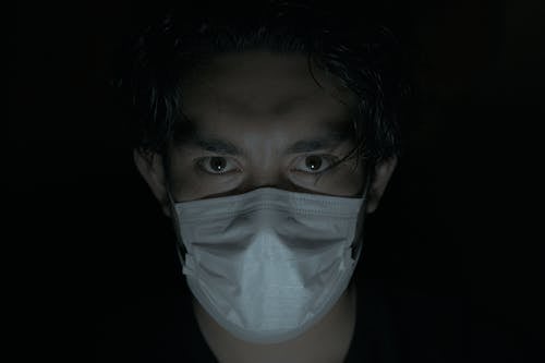 Serious Man Wearing Face Mask