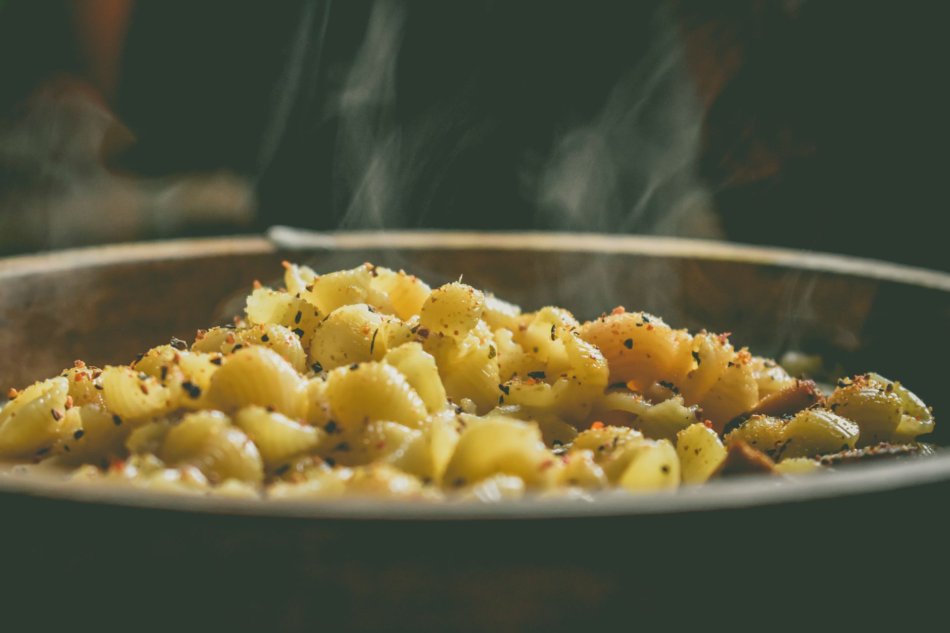 Close-up of golden cheesy popcorn in a bowl