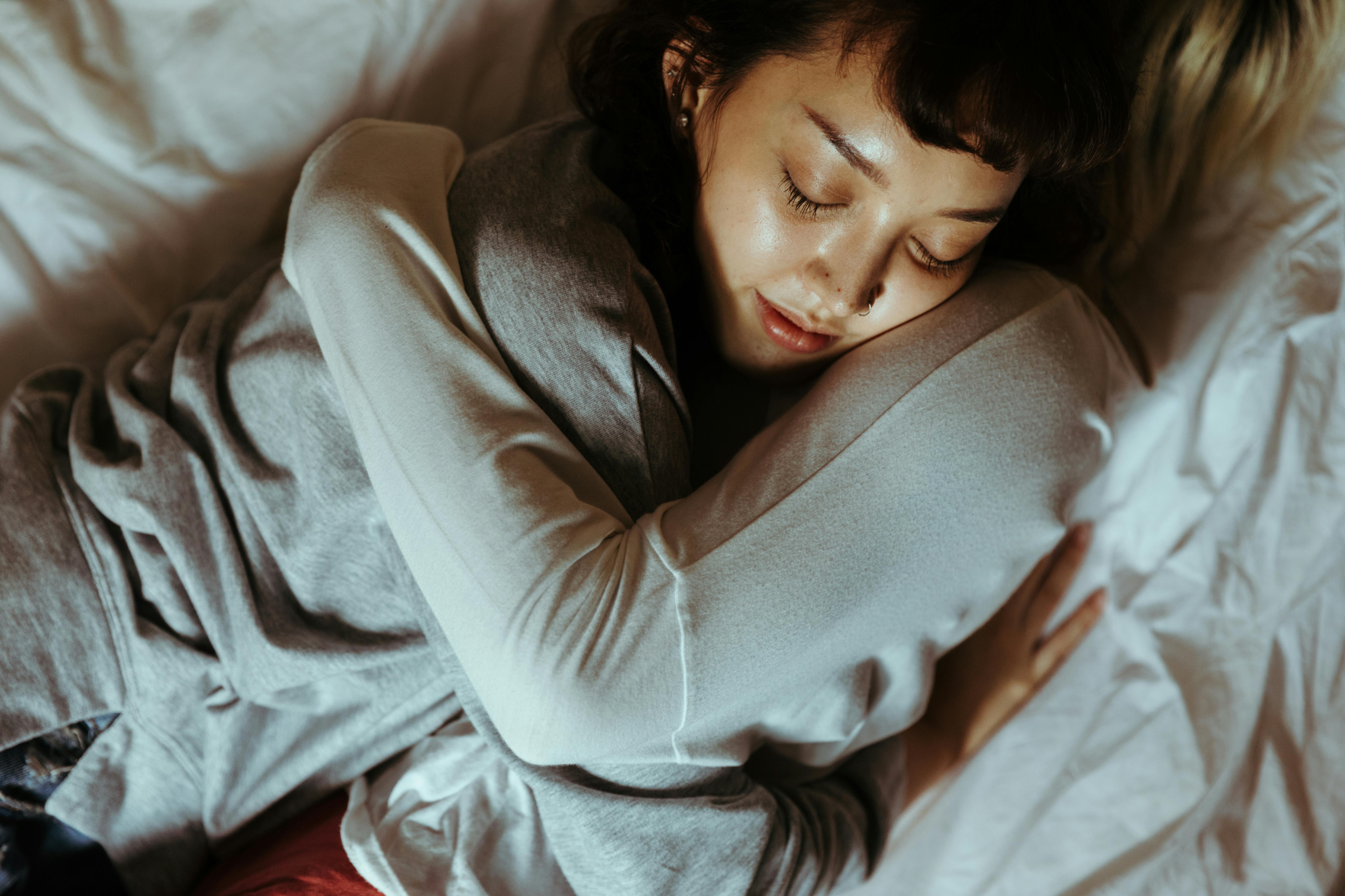 Women Hugging in Bed · Free Stock Photo