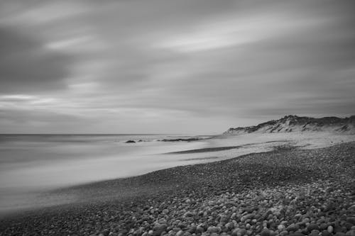 Grayscale Photography of a Beach