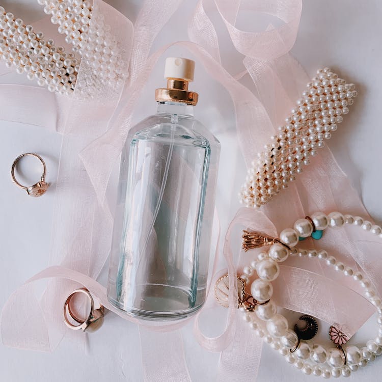 Feminine elegant jewelry and perfume bottle