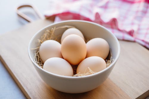 White Eggs in White Ceramic Bowl
