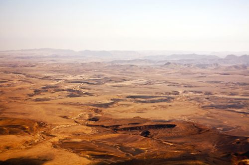 Free Expansive aerial view of Negev Desert's arid landscape in Southern Israel. Stock Photo