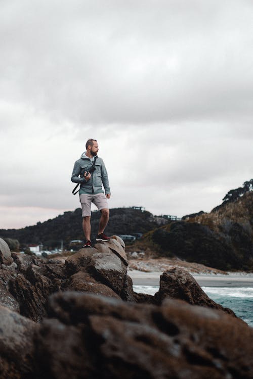 Man Standing on Coast