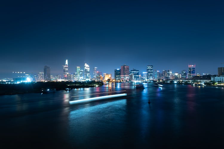 Colorful Lights In The City Skyline During Night Time