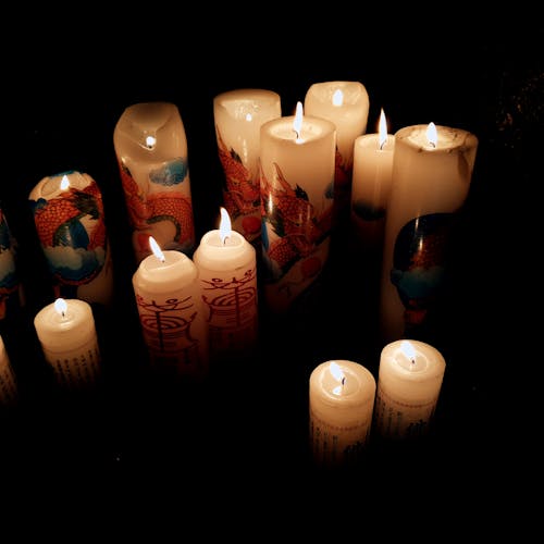 Бесплатное стоковое фото с Буддизм, горящая свеча, свеча