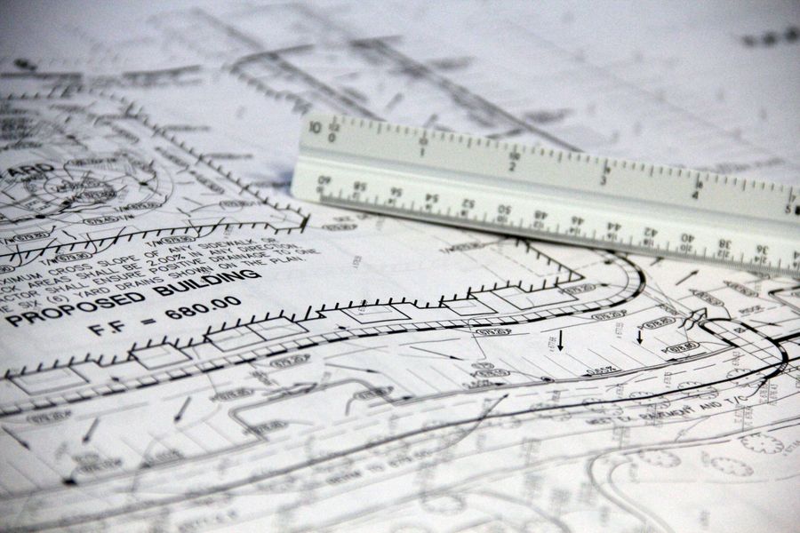 Blueprints and scale ruler for a material takeoff