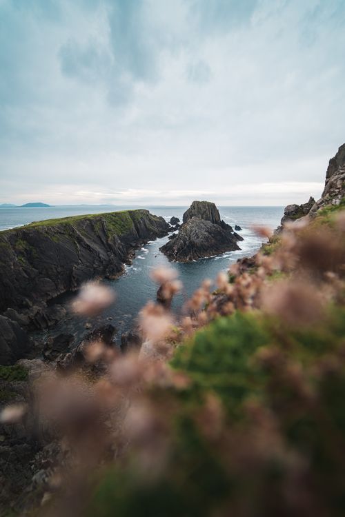 Free Breathtaking view of Irish sea cliffs and rock formations along the coastline. Stock Photo