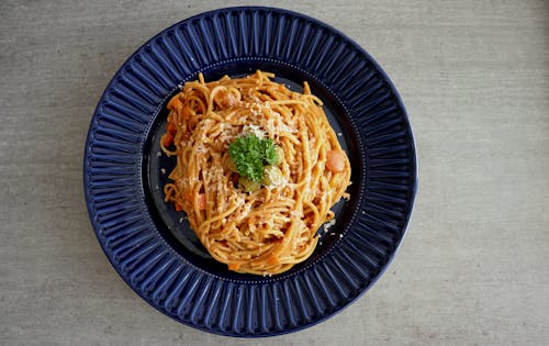 Filipino Style Spaghetti on Blue Plate