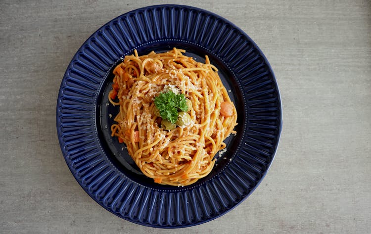 Filipino Style Spaghetti On Blue Plate