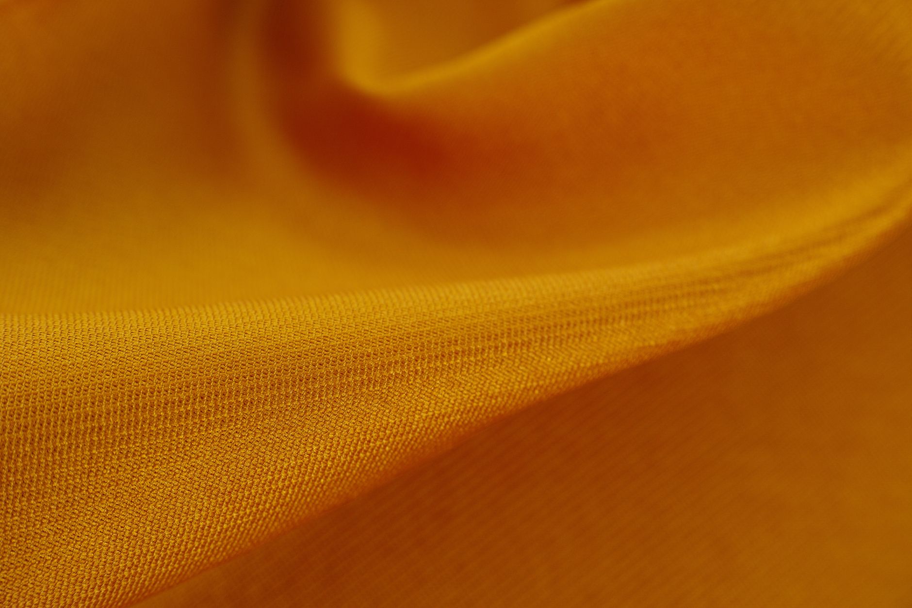 close-up comparison of wool-polyester suiting fabrics at different blend ratios showing surface texture variation