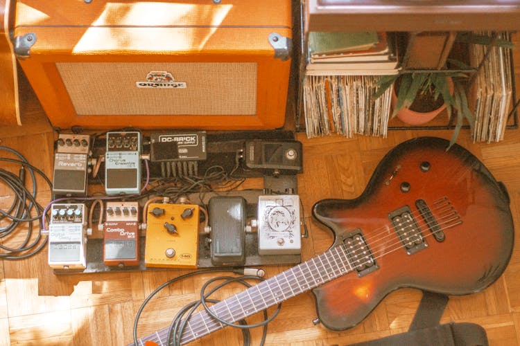 Electric Guitar And Effects Pedal On The Floor