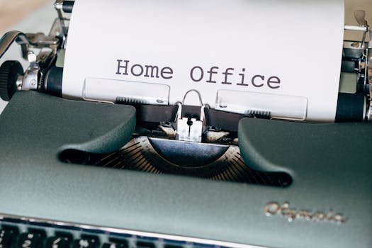 Close-up of vintage typewriter with paper displaying 'Home Office'.