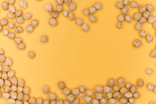 Free Chickpeas on a Yellow Background Stock Photo