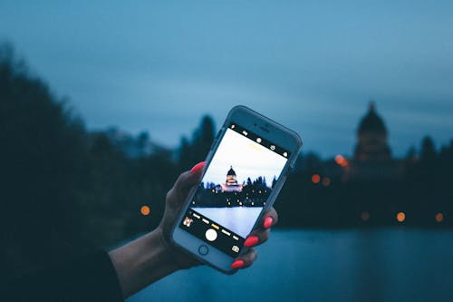 Free Person Holding Iphone Stock Photo