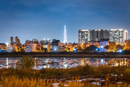 A River Near the City during Night Time