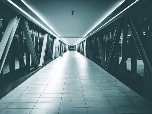 Free A modern indoor walkway featuring geometric designs and sleek lighting in Toronto. Stock Photo