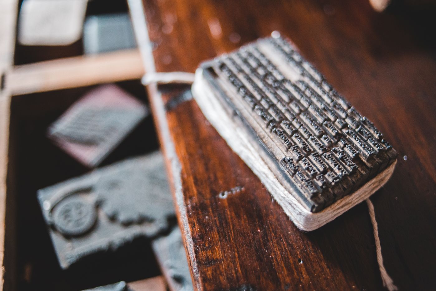 Wooden letterpress printing plate on a workbench — Erik Mclean on Pexels