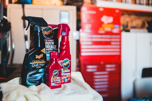 Set of car cleaning products in garage