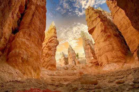 Breathtaking view of towering sandstone formations under a dramatic sky, showcasing natural erosion.