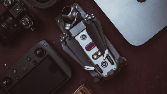 Camera and lenses laid out from above — photo by The Lazy Artist Gallery on Pexels